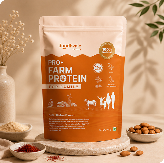 Doodhvale Farms Pro+ Farm Protein for Family in Kesar Badam flavour, displayed with almonds, saffron, and a warm natural lifestyle setting.